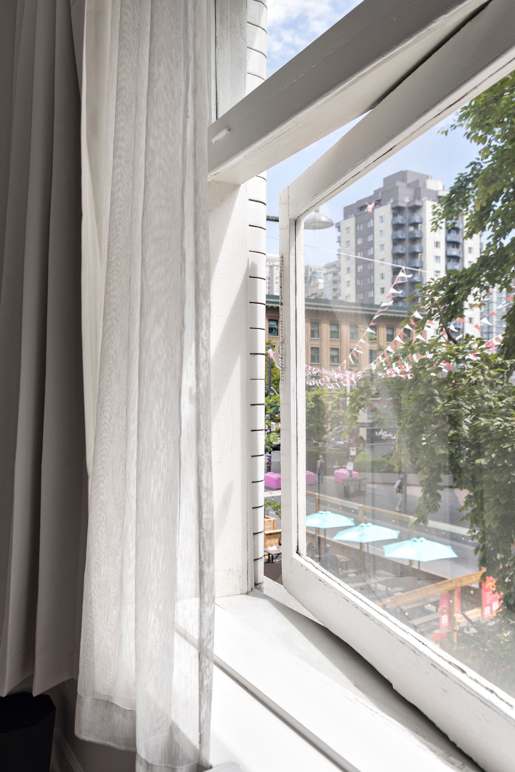 View of Granville Street from a guest room at Hotel Modo Vancouver
