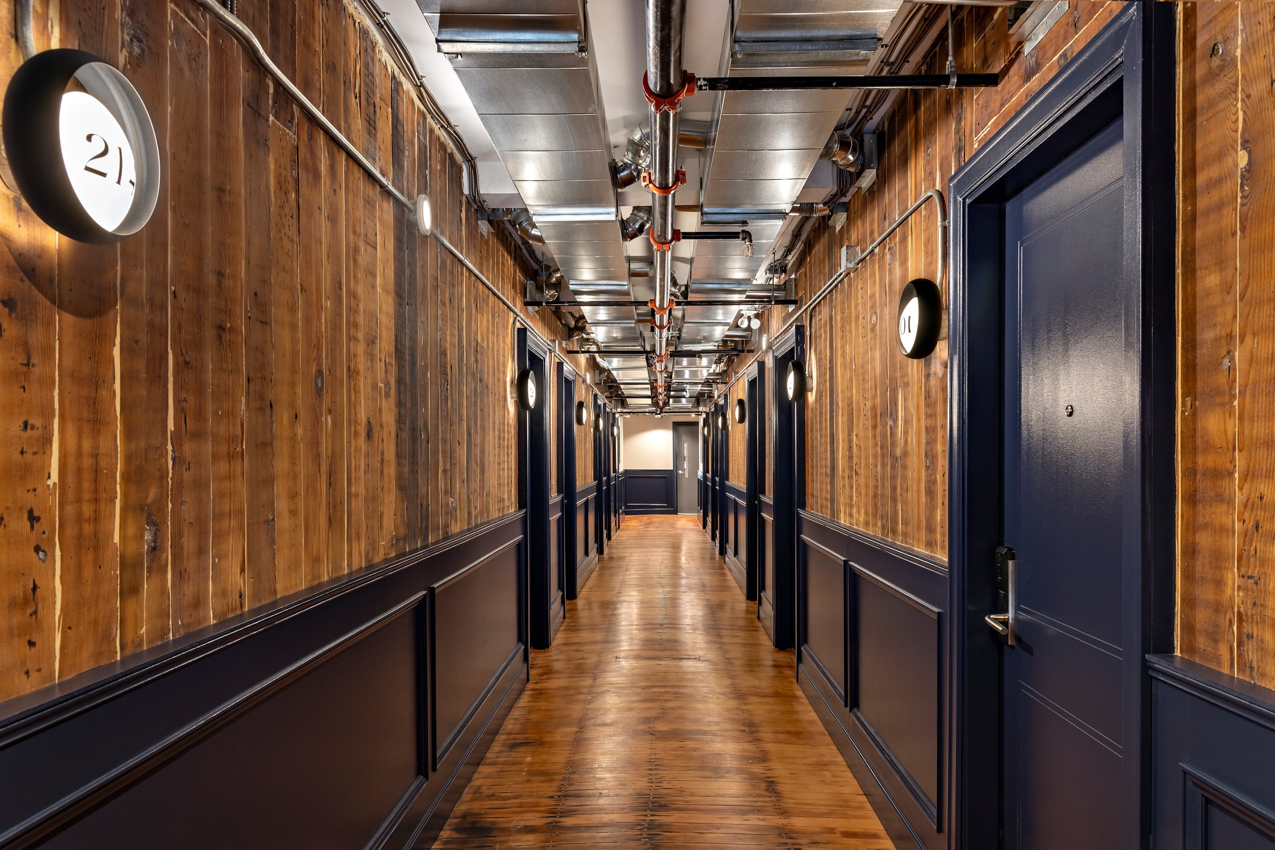 Original wood-panelled hallway inside Hotel Modo in downtown Vancouver